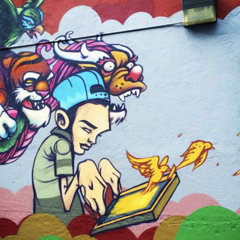 mural of cartoon boy good vs evil