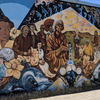 mural of female spirits in offering