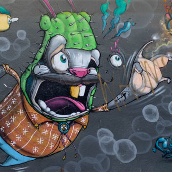 cartoon animal in cactus costume mural