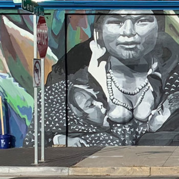 black and white mural of woman breastfeeding