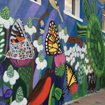scene of flora and fauna mural on wall