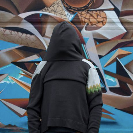 hooded figure from behind