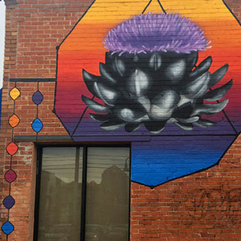 mural of artichoke and arrow