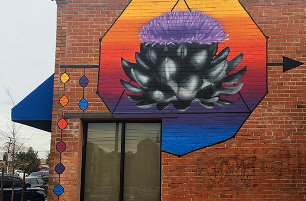 mural of artichoke and arrow