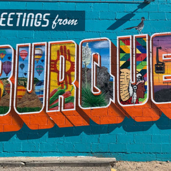 block letters filled with images of NM