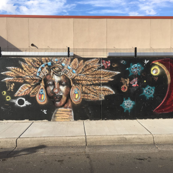 mural of indian woman closing eyes