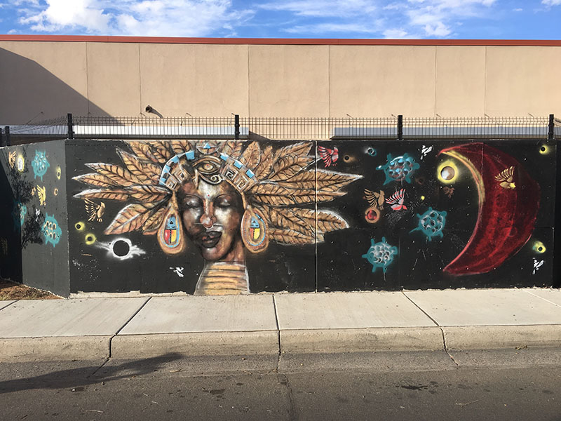 mural of indian woman closing eyes