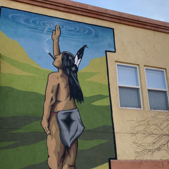 mural of smoking Indian salute