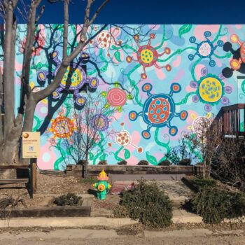 Pastel mural with stylized bacteria