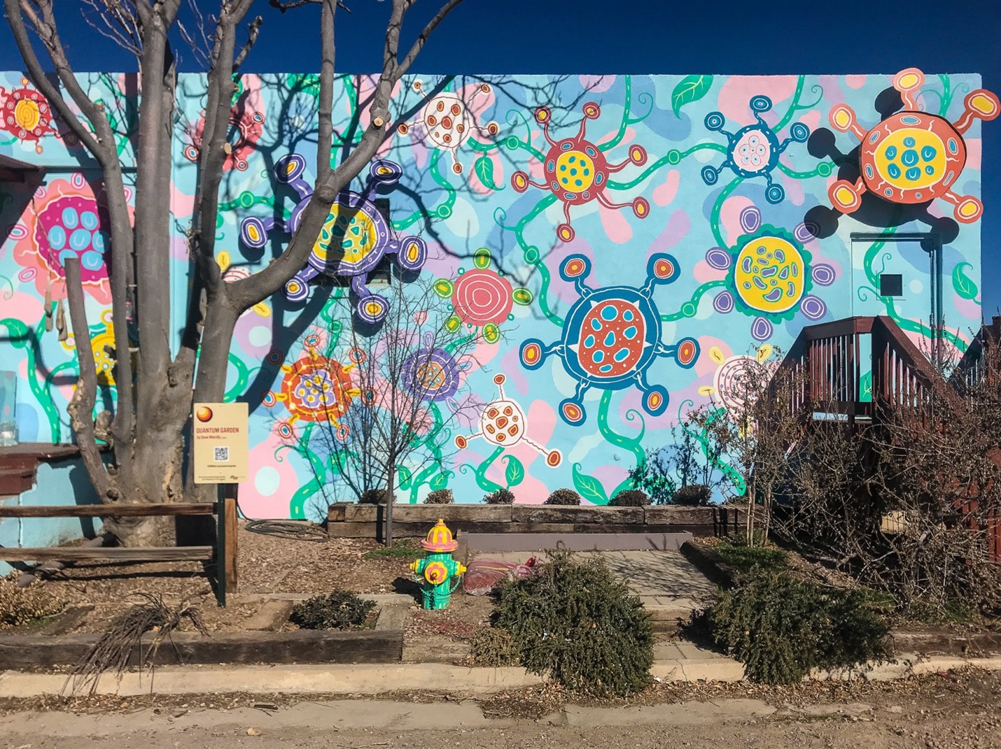 Pastel mural with stylized bacteria